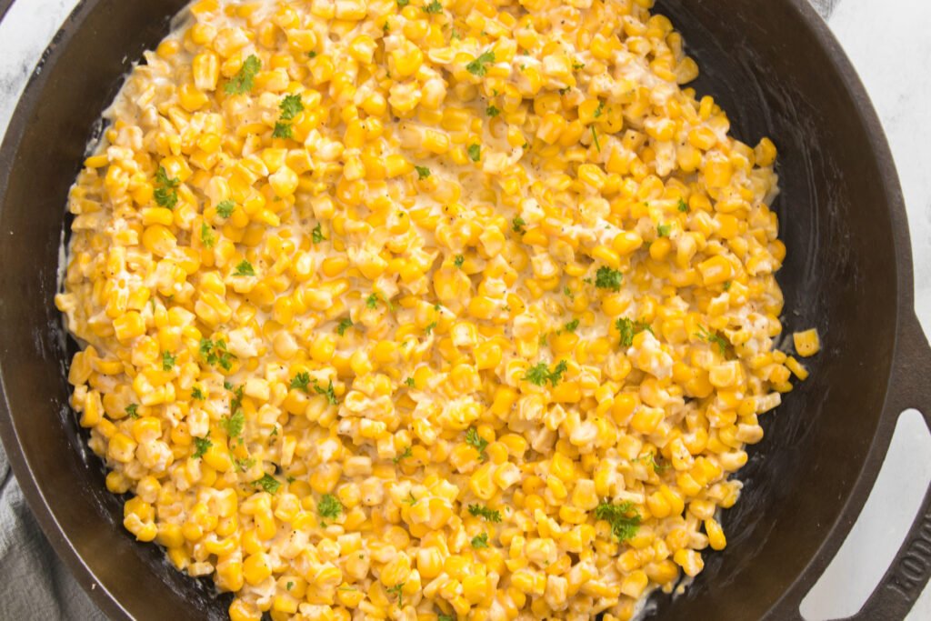 creamed corn in a skillet