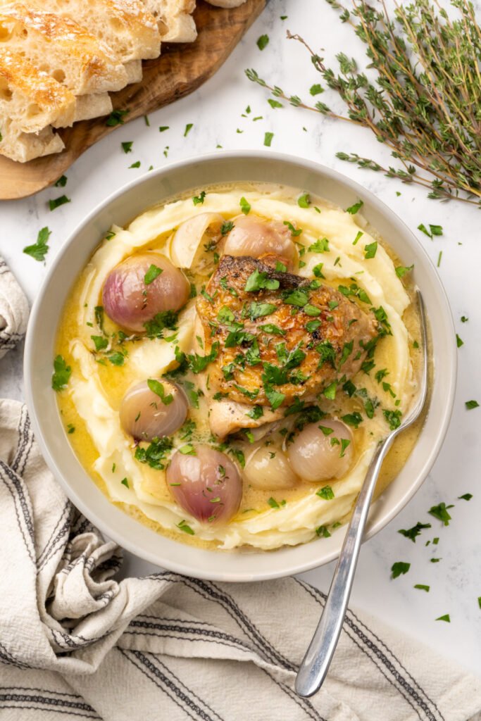 Coq au Vin Blanc with chicken thighs and white wine sauce