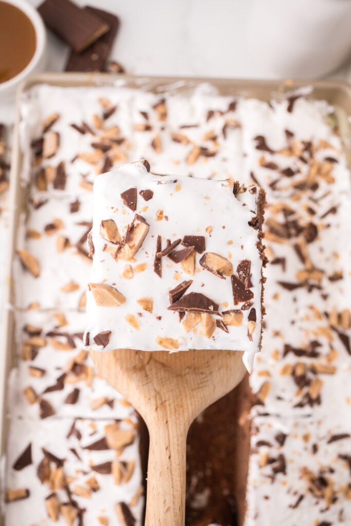slice of chocolate caramel poke cake